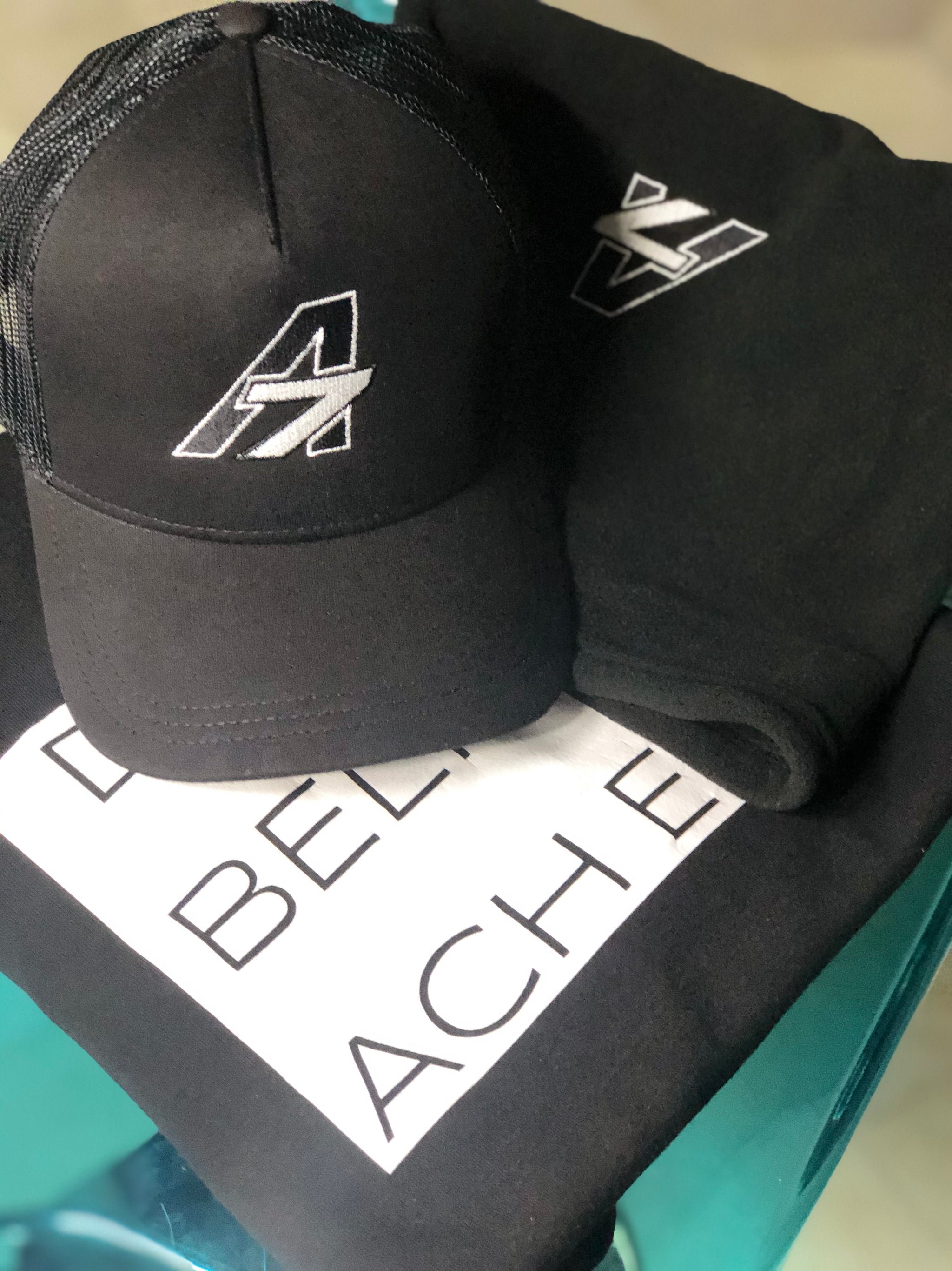 A7 Asher Black Trucker hat, with White embroidered  A7 logo