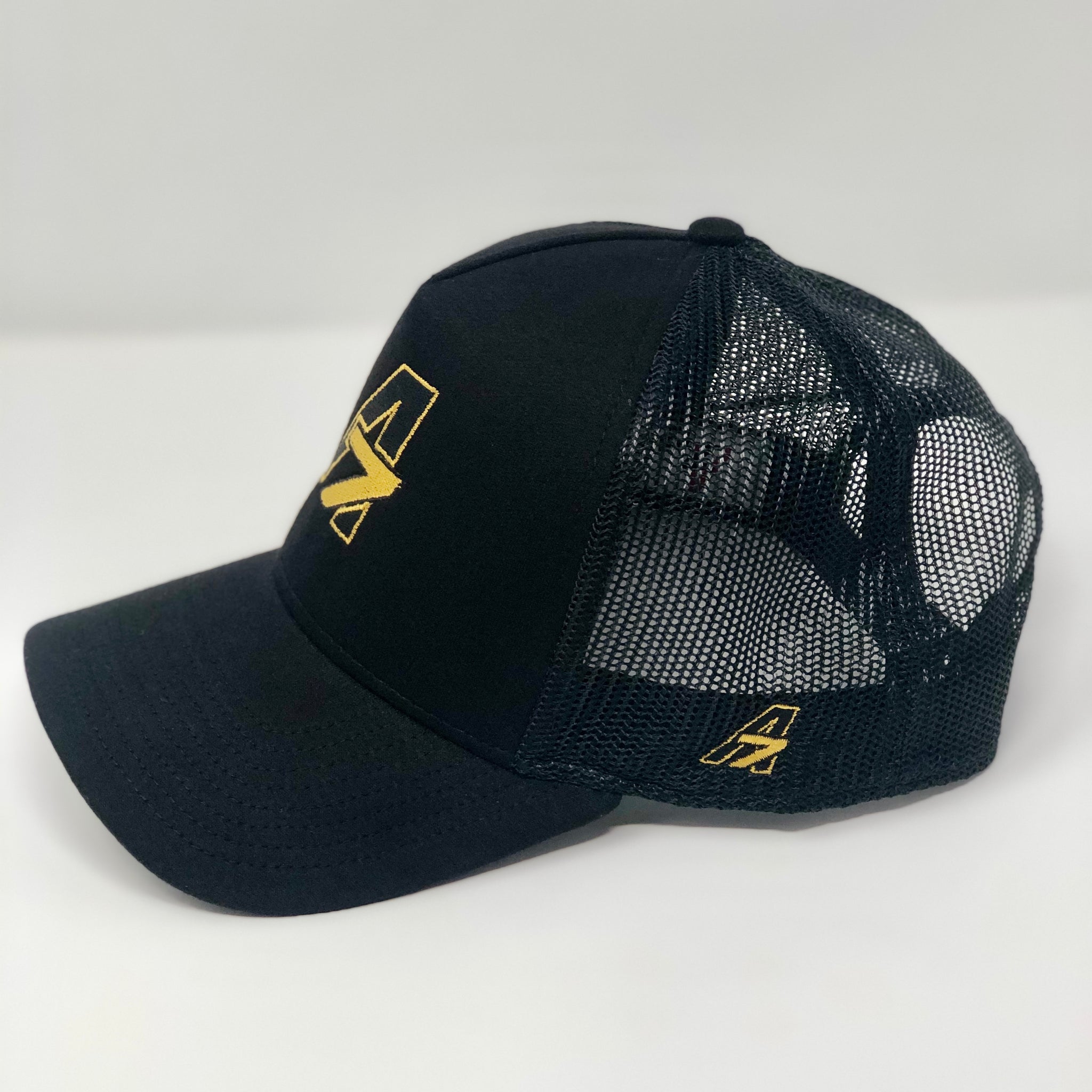 A7 Asher Black Trucker hat, with gold embroidered  A7 logo
