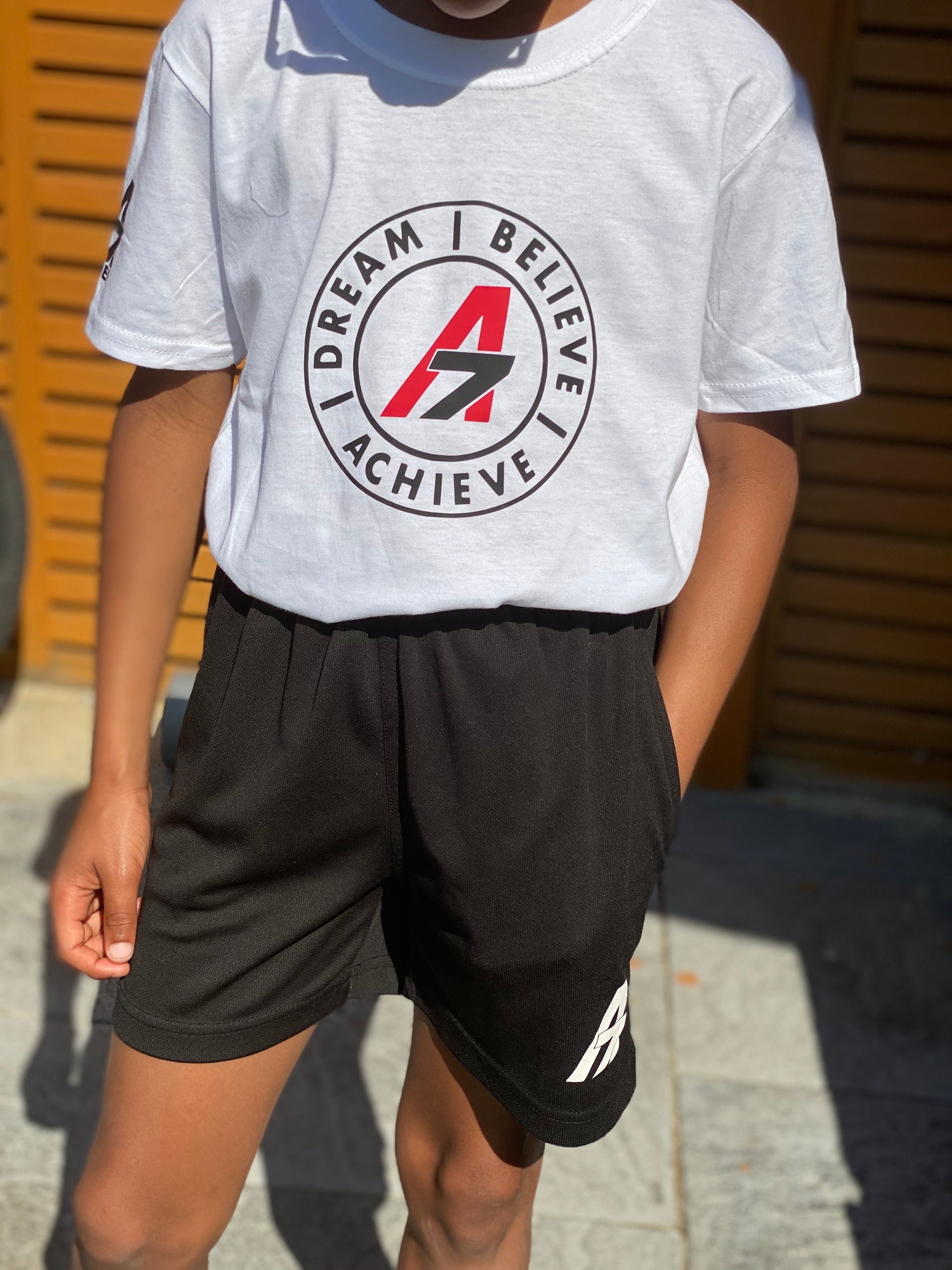 A7 Asher Dream| Believe| Achieve circle logo white Kids Tshirt